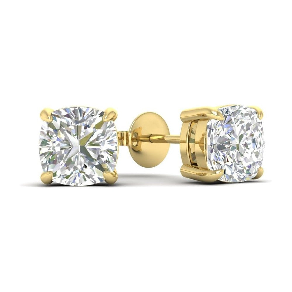 Gold stud earrings with clear cushion cut moissanite diamond gemstones on a white background