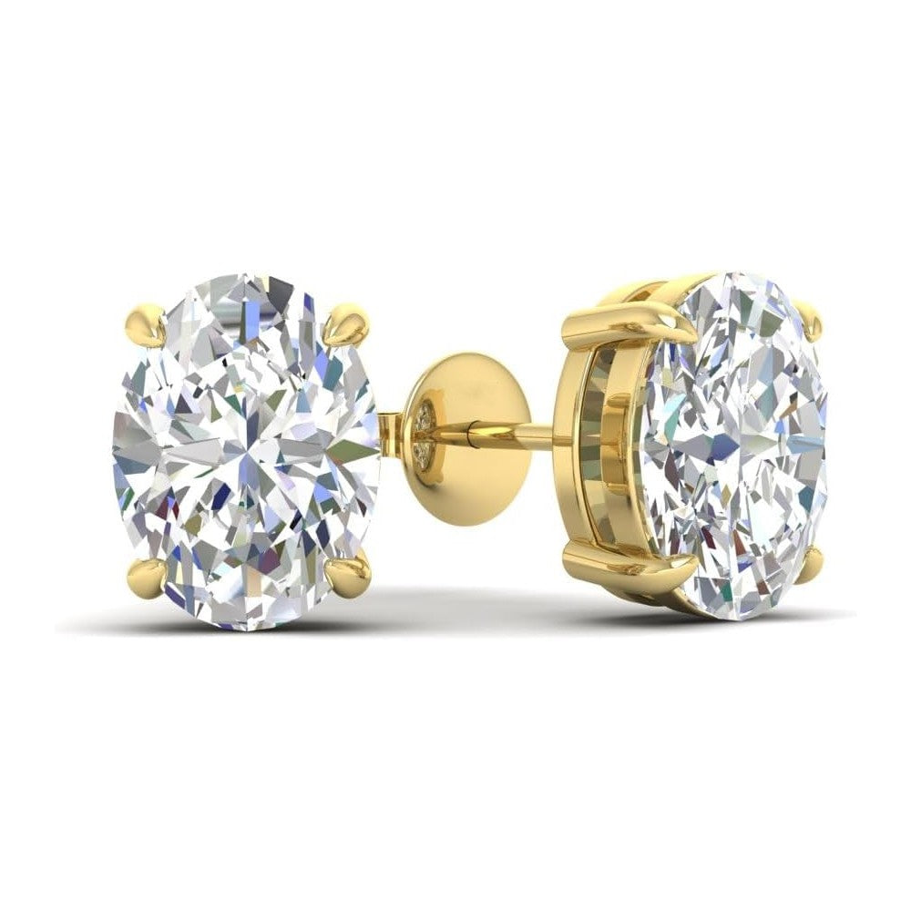 Gold stud earrings with large clear oval cut moissanite diamonds gemstones on a white background