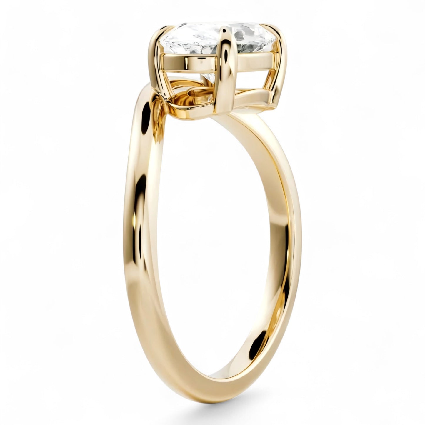 Gold ring with a diamond on a white background
