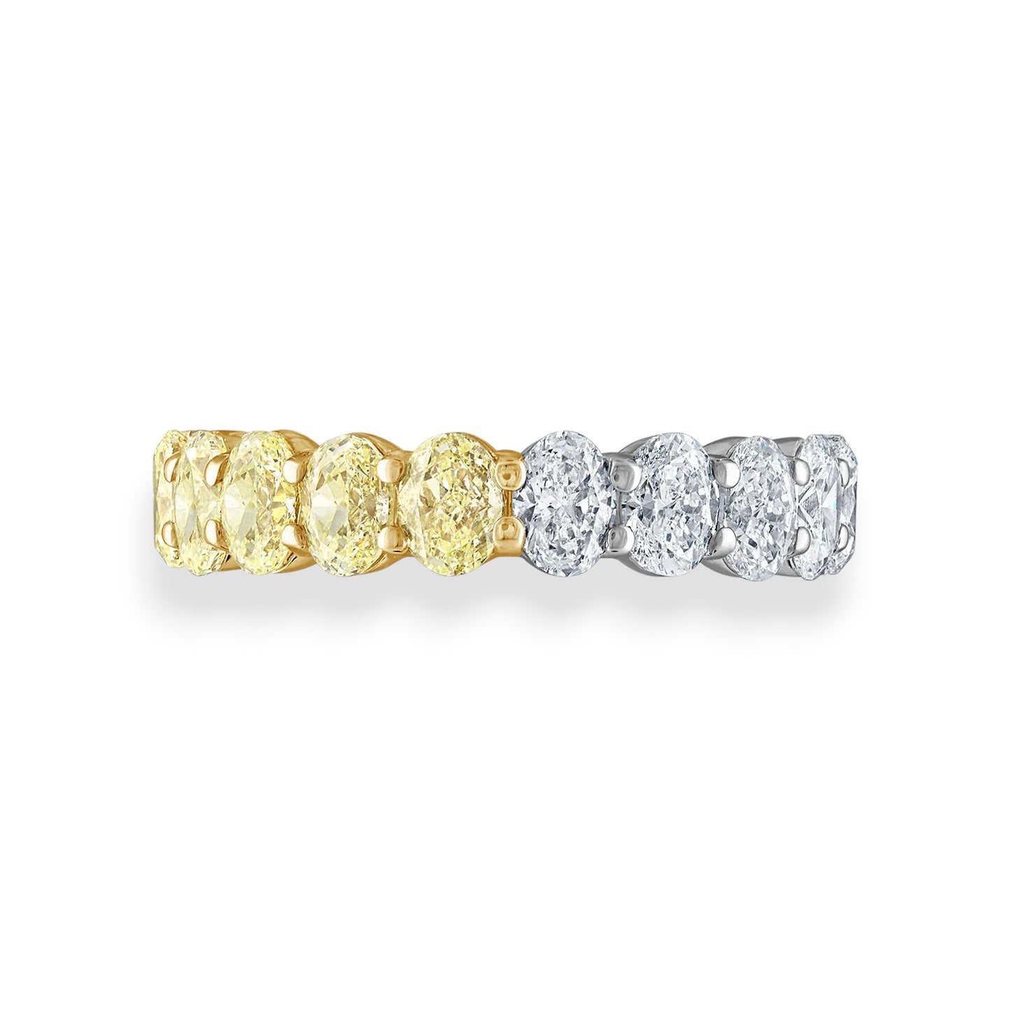 Two diamond rings, one gold and one silver, on a white background