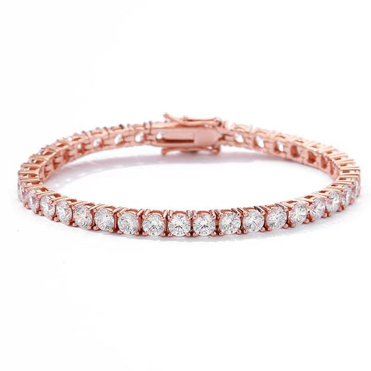 Rose gold bracelet with clear gemstones on a white background
