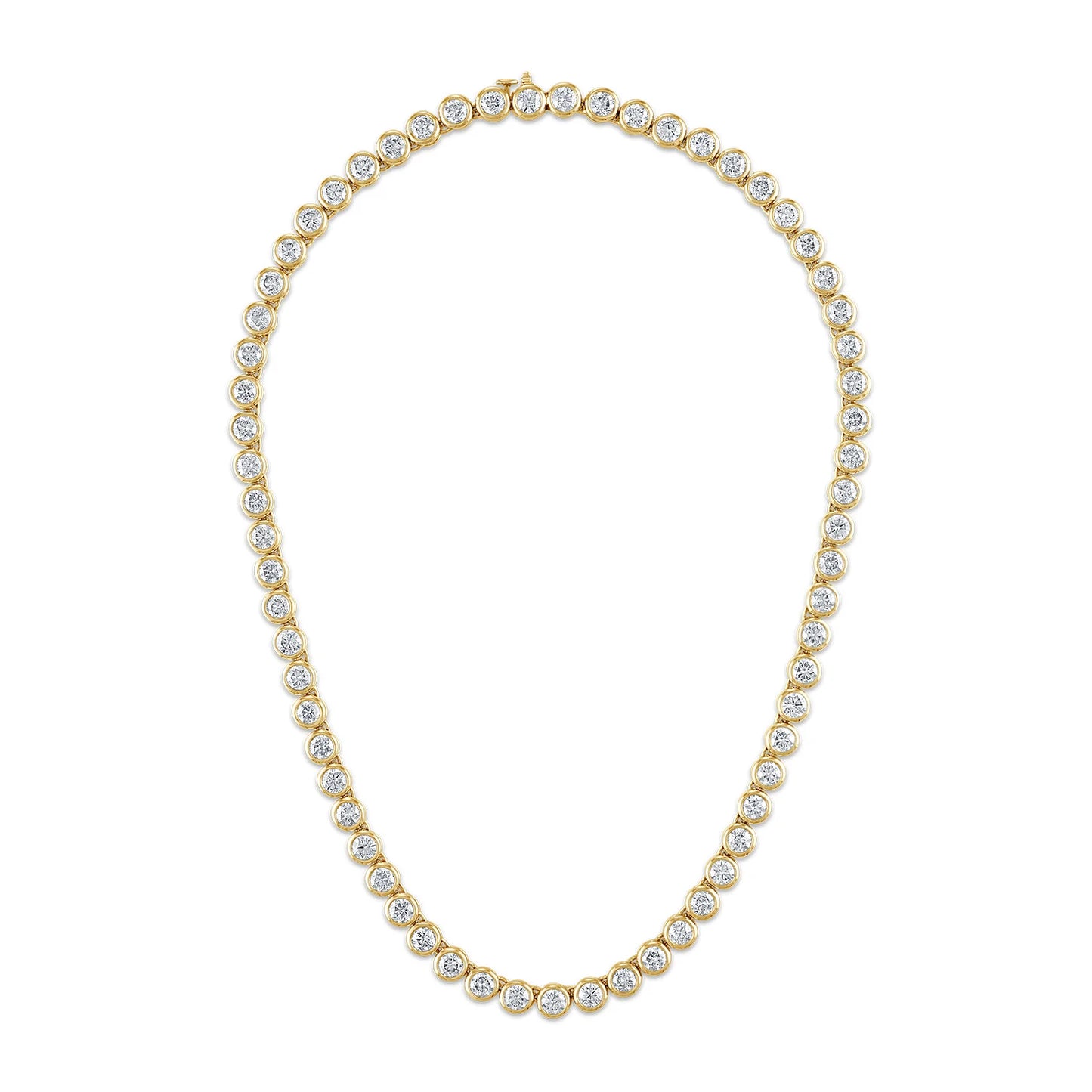 Gold necklace with clear stones on a white background