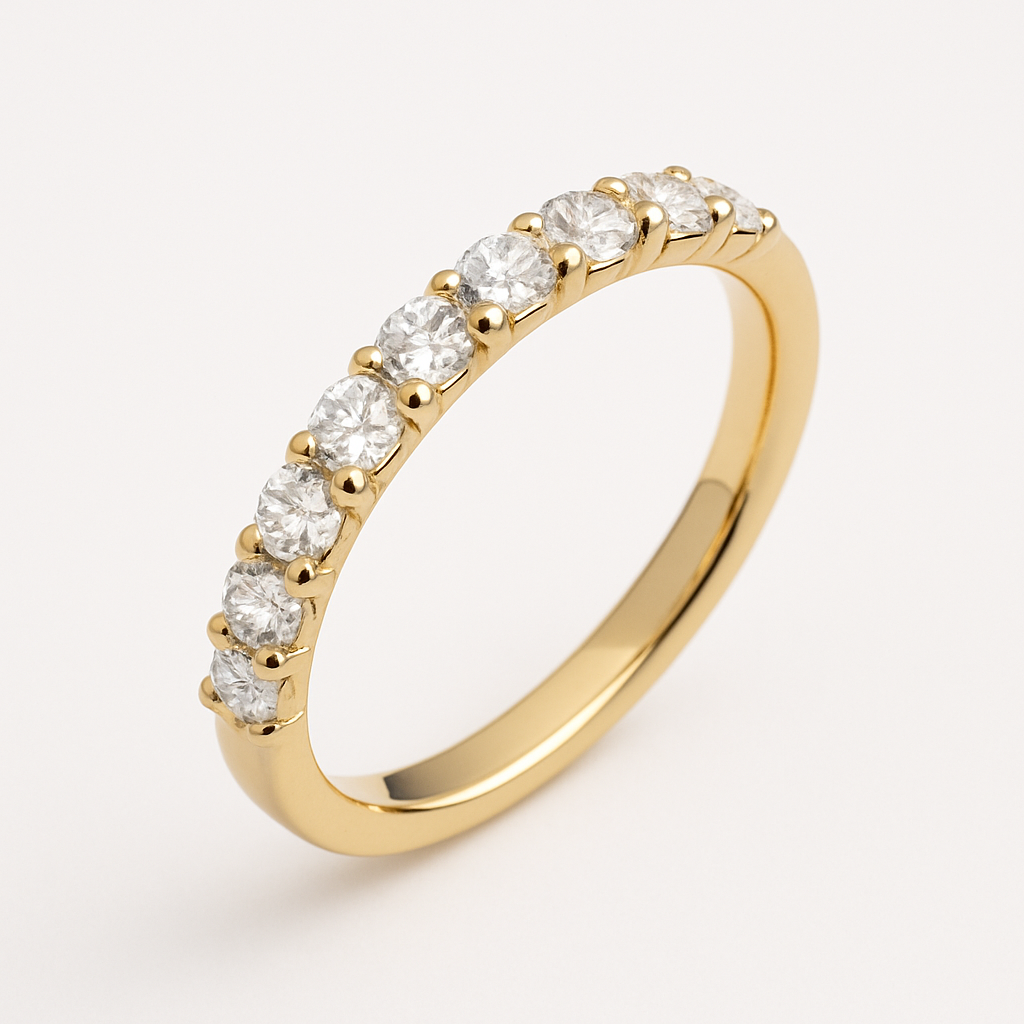 .5 mm Half Eternity Band in 14k yellow gold on a crisp white background. Ten brilliant-cut moissanite stones are set in delicate prongs along half of the band, with the polished gold surface and finely aligned gems highlighted by even lighting to show the ring’s elegant craftsmanship.
