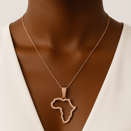 woman wearing map of africa pendant necklace created with moissanite diamonds and gold silver