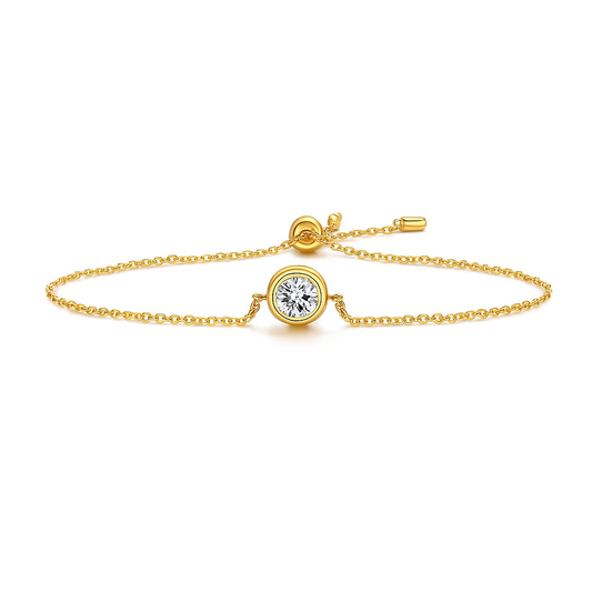 Gold adjustable bracelet with a bezel-set 0.5 carat round brilliant moissanite diamond centrepiece, featuring a fine chain and sliding clasp, displayed on a white background.