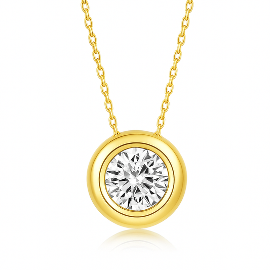 Gold bezel set 1 carat moissanite pendant necklace featuring a round brilliant-cut stone on a delicate gold-plated cable chain, displayed against a white background
