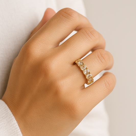 Woman wearing a champagne colour oval cut moissanite wedding band in 14k gold in Sydney Australia