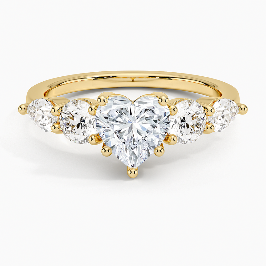 Gold ring with five heart-shaped diamonds on a white background. Heart Five Stone Moissanite Ring