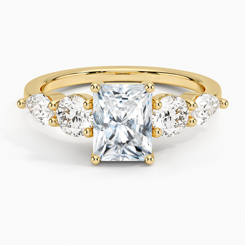 Gold ring with a central square-cut diamond and three smaller round diamonds on a white background. Radiant Five Stone Moissanite Ring