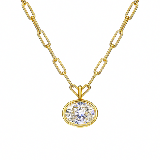 Gold necklace with a round diamond pendant on a white background