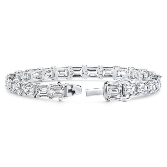 Diamond bracelet with baguette and round cut stones on a white background