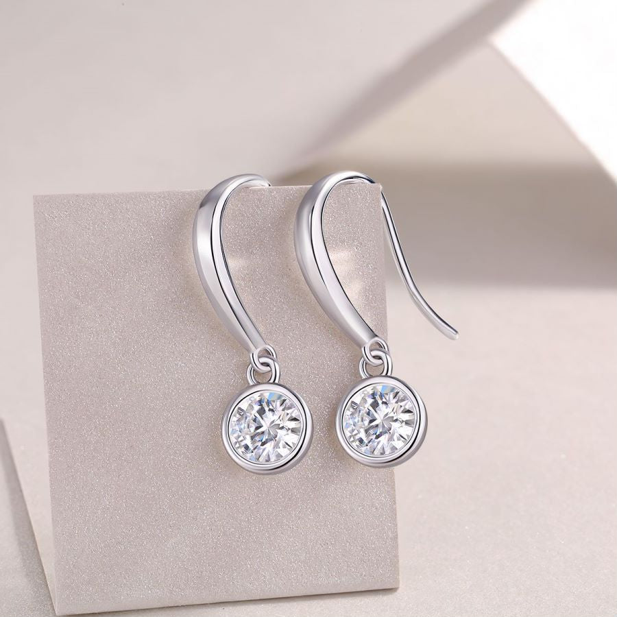 Gold-plated sterling silver drop earrings with bezel-set round moissanite stones, modern ethical diamond alternative jewellery in Australia