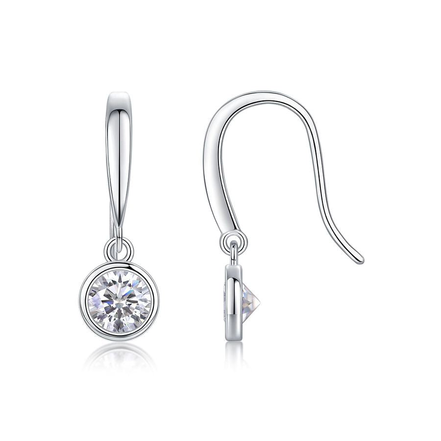 Silver earrings with clear gemstones on a white background