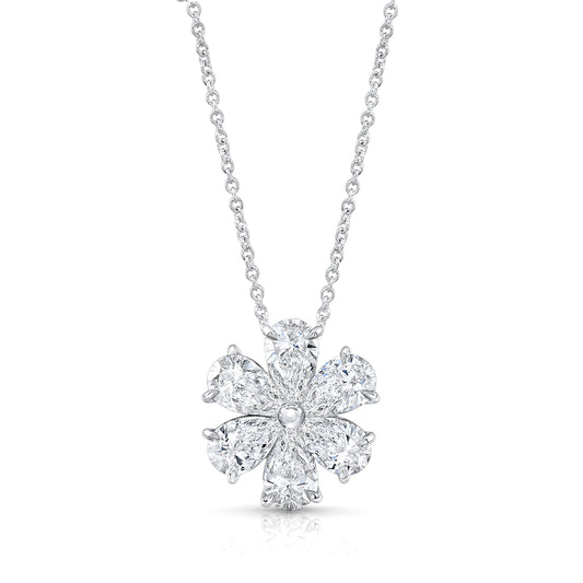 Diamond snowflake pendant on a chain against a white background
