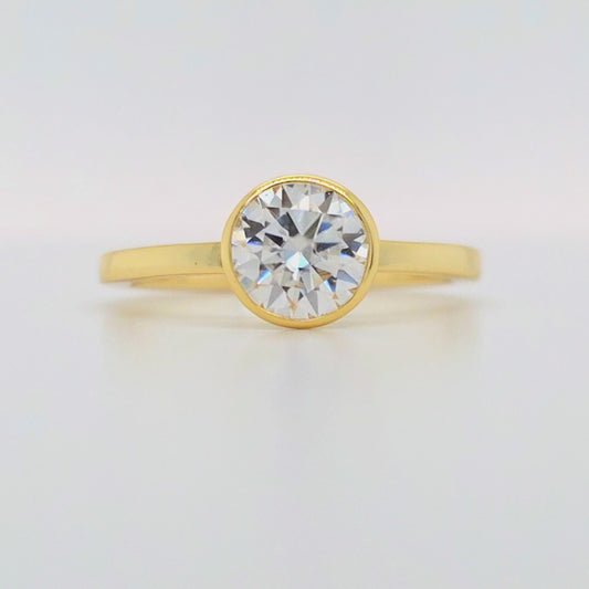 1 carat round cut bezel set moissanite ring in gold-plated sterling silver with flat 1.5mm band – ethical moissanite jewellery Sydney, Australia
