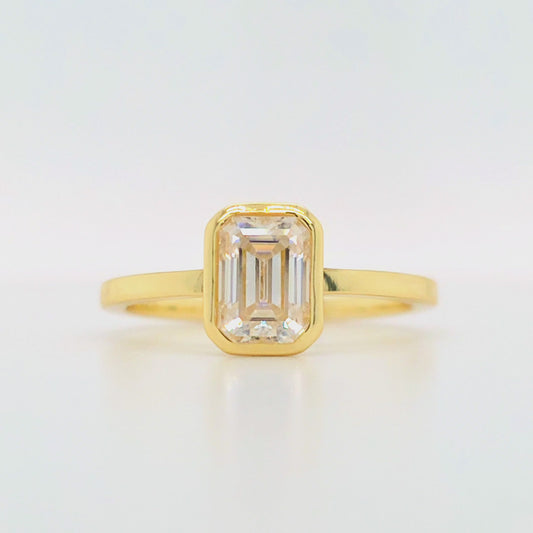 1 carat emerald cut moissanite engagement ring with bezel setting in gold-plated silver – ethical diamond alternative Australia, handcrafted
