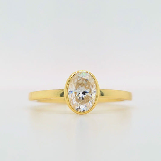 1 carat oval bezel set moissanite ring in gold-plated silver with flat band – modern diamond alternative engagement ring Sydney Australia