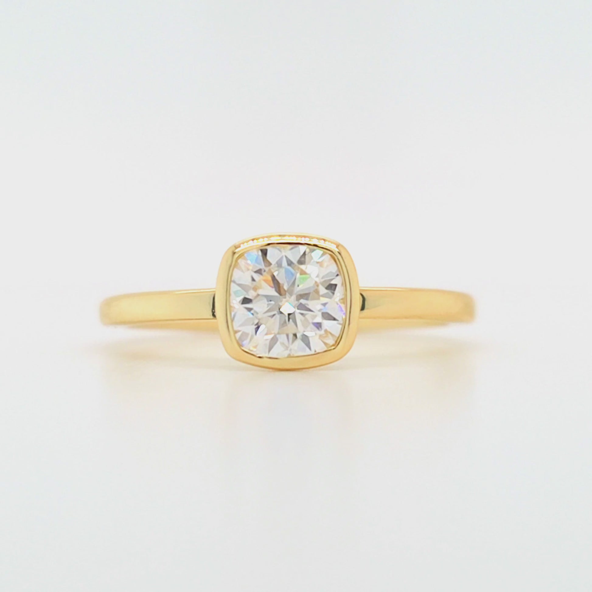 1 carat cushion cut bezel set moissanite ring in gold-plated sterling silver with flat band – moissanite jewellery Sydney, Australia