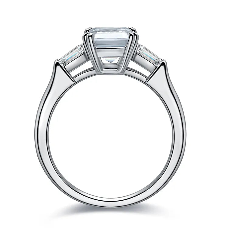 Emerald cut moissanite ring with baguette side stones. A timeless engagement ring in yellow gold. Ethical moissanite jewellery Australia.