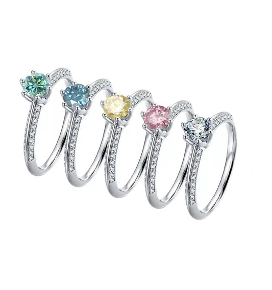 Pink blue green white yellow 0.5 Carat Round Coloured Moissanite Ring on white backgroud