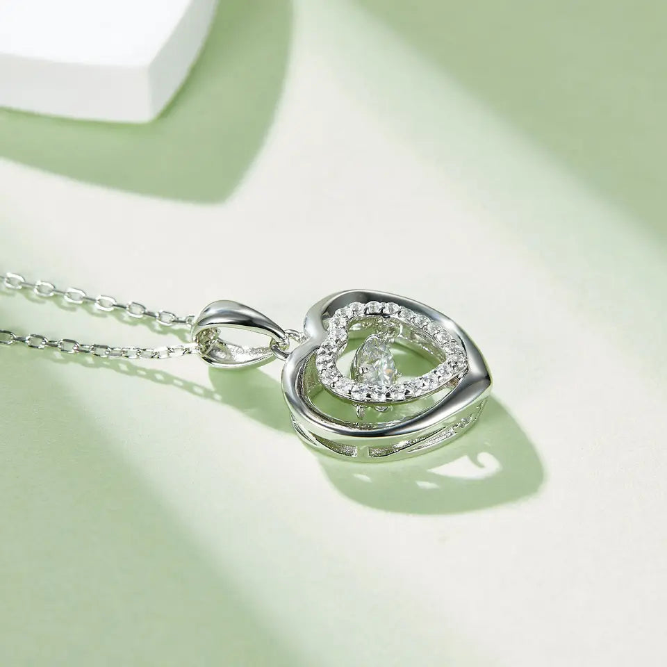 Dancing Moissanite in Double Heart Pendant