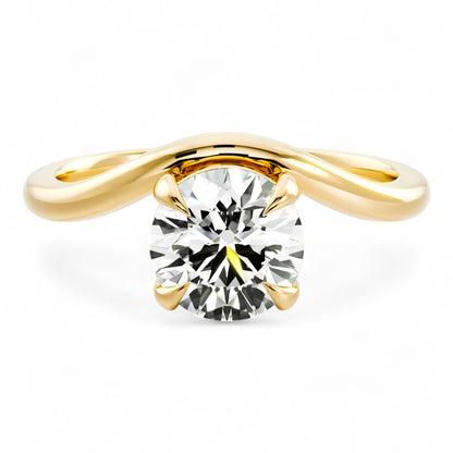 2 carat round moissanite engagement ring in yellow gold. Bold curved setting, brilliant sparkle. Ethical moissanite jewellery Australia.