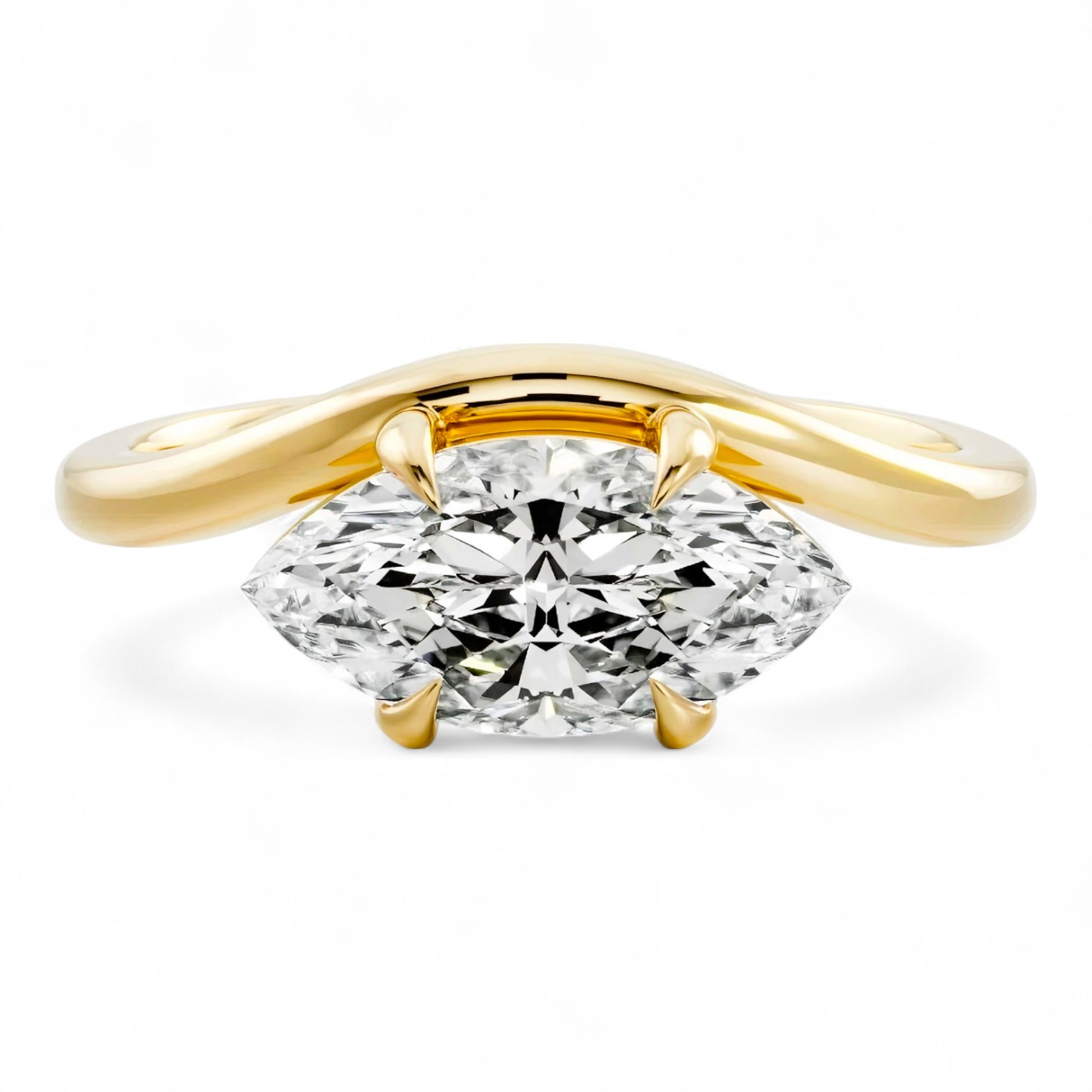 2 carat marquise moissanite engagement ring in yellow gold. Sculptural and bold with curved design. Ethical bridal jewellery Australia.