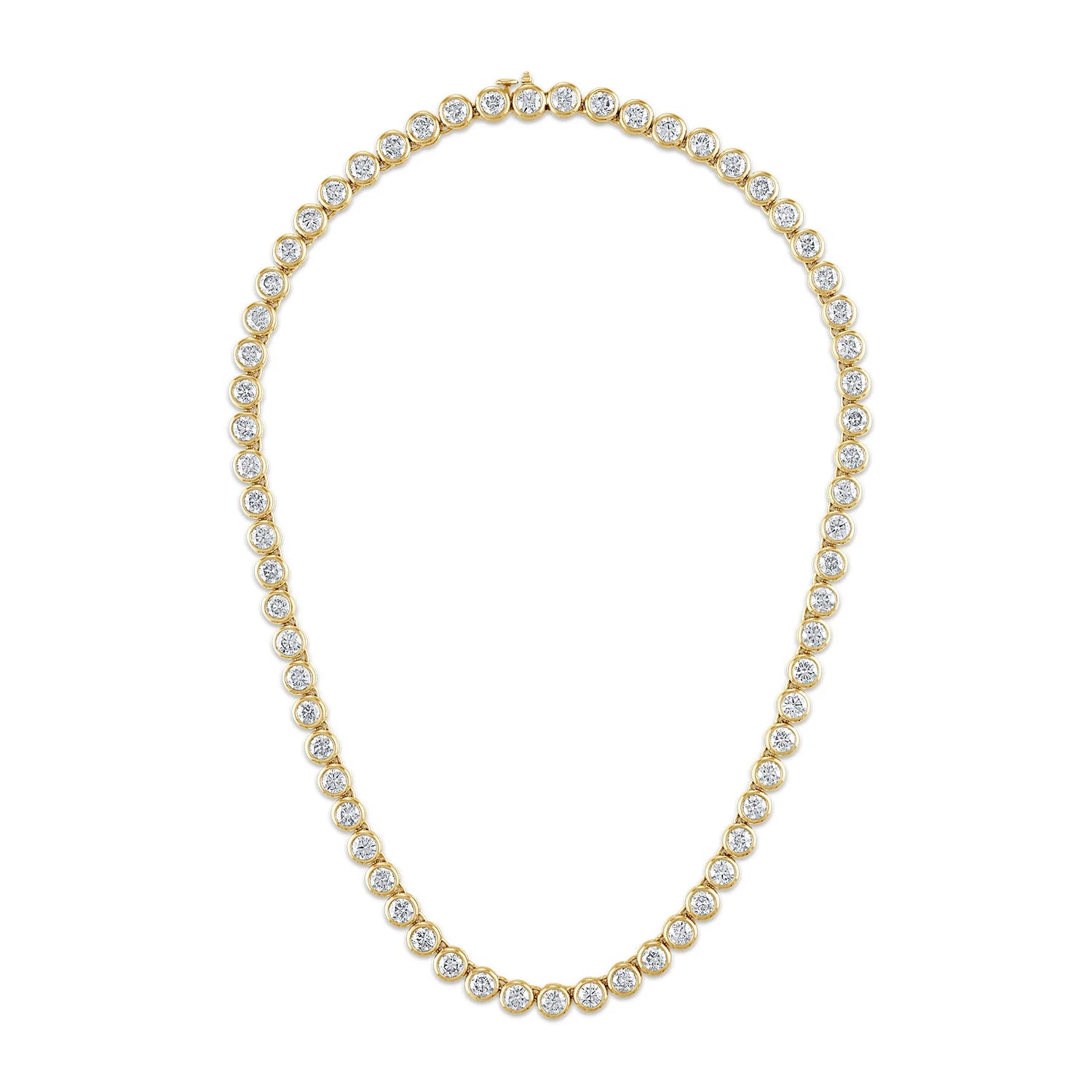 Gold necklace with clear stones on a white background