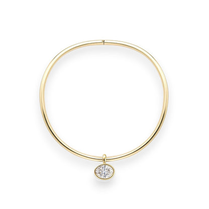 Gold bracelet with a diamond on a white background. 6.5ct oval moissanite torque necklace in bezel setting on solid 14k yellow gold choker – Gems of Elah