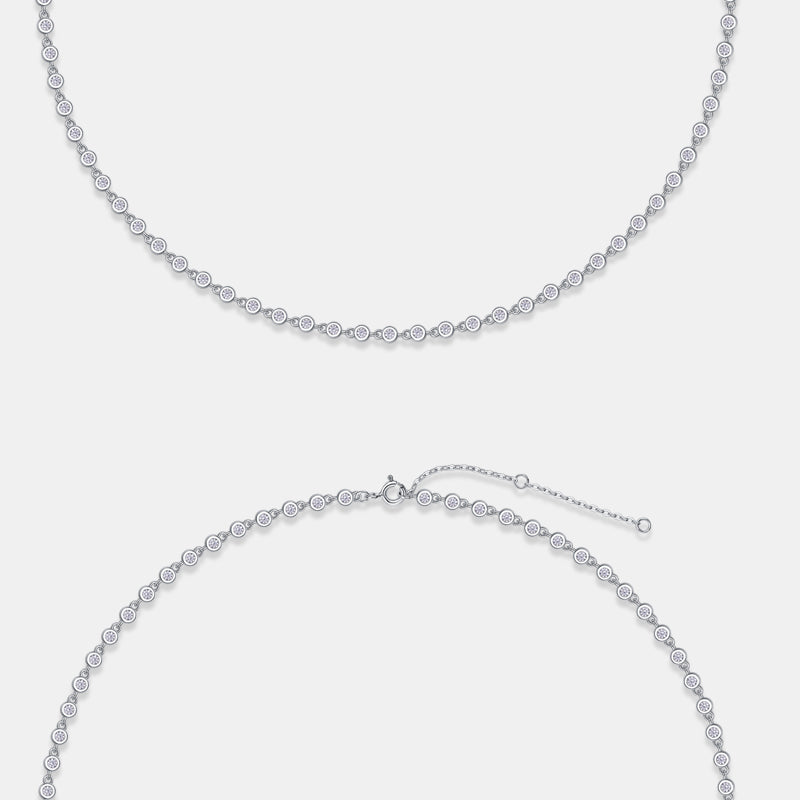 Bezel-set moissanite tennis necklace in gold, round brilliant stones in full circle design. Ethical diamond alternative. Moissanite jewellery Australia