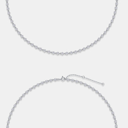 Bezel-set moissanite tennis necklace in gold, round brilliant stones in full circle design. Ethical diamond alternative. Moissanite jewellery Australia