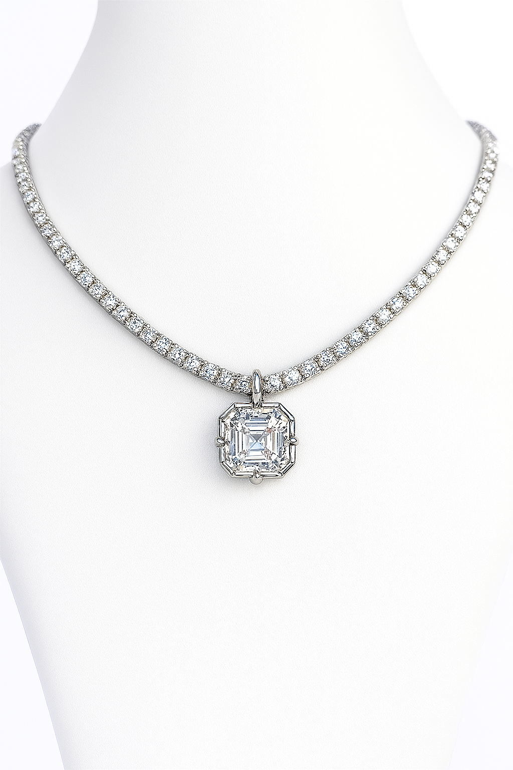 Diamond necklace with a pendant on a mannequin against a white background. Brilliant Asscher-Cut Moissanite Diamond Attachable Pendant