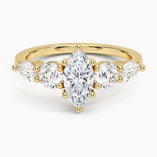 Gold ring with clear gemstones on a white background. Marquise Five Stone Moissanite Ring