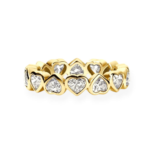 Gold ring with heart-shaped diamond stones on a white background.