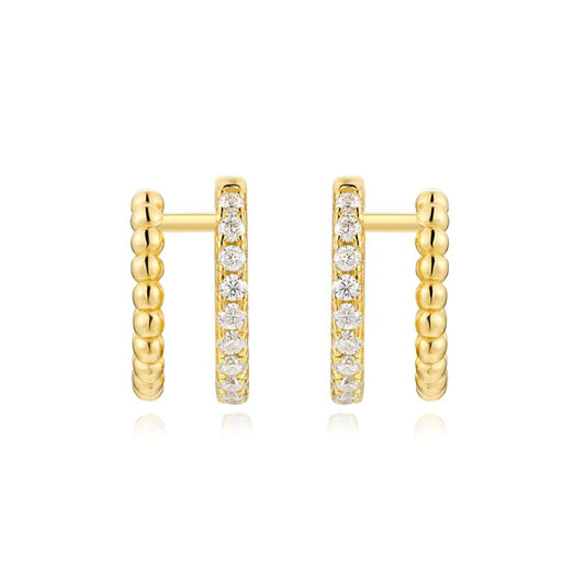 Gold hoop earrings with embedded diamonds on a white background