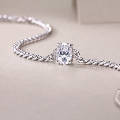 Rhodium-plated sterling silver moissanite bracelet with oval stone and curb chain. Ethical moissanite jewellery Australia, diamond alternative bracelet