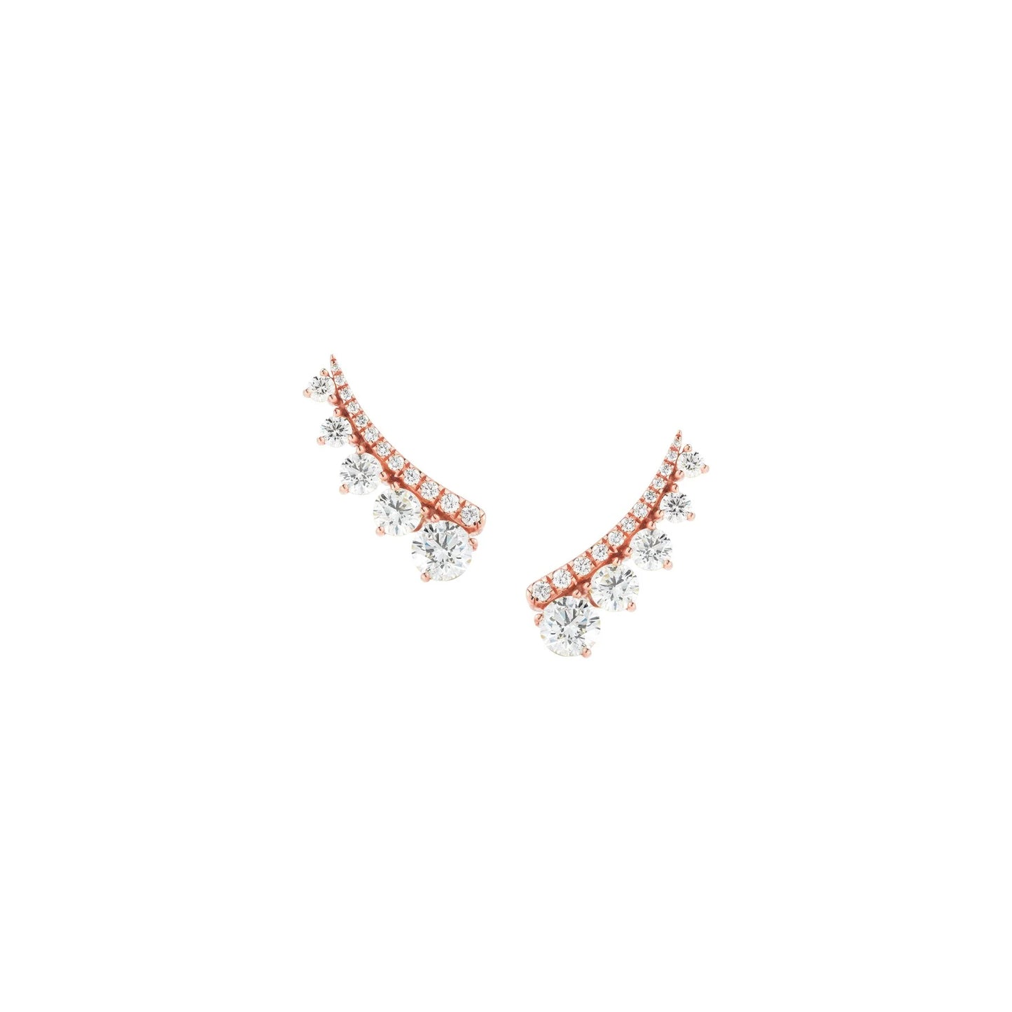 Pair of rose gold and silver earrings on a white background