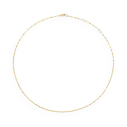 Gold necklace on a white background