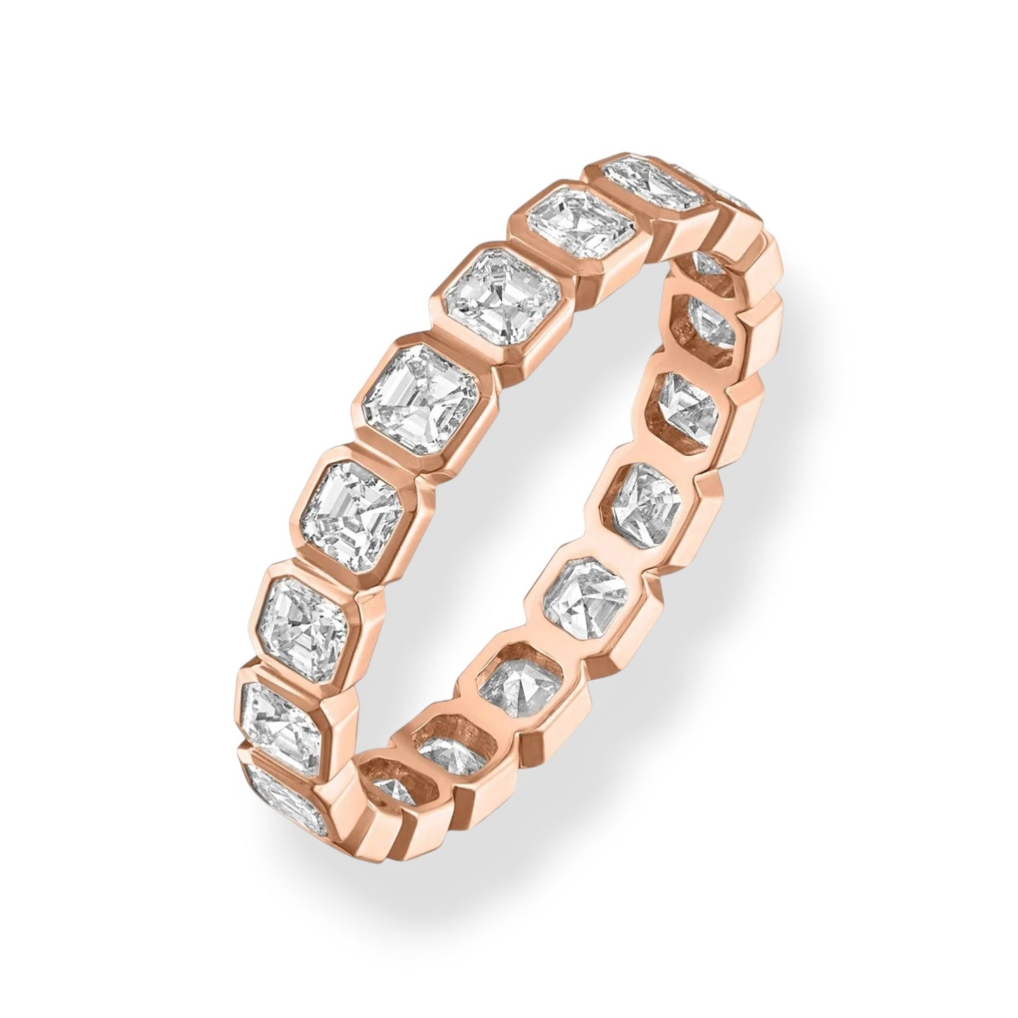 Rose gold ring with diamonds on a white background
