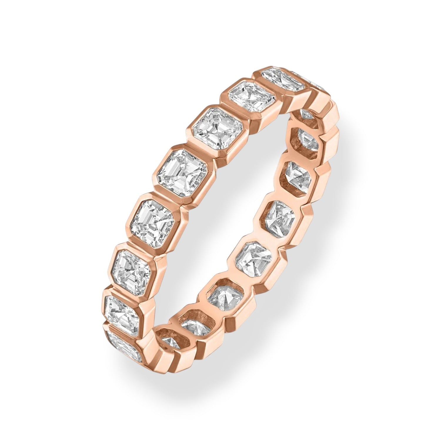 Rose gold ring with diamonds on a white background