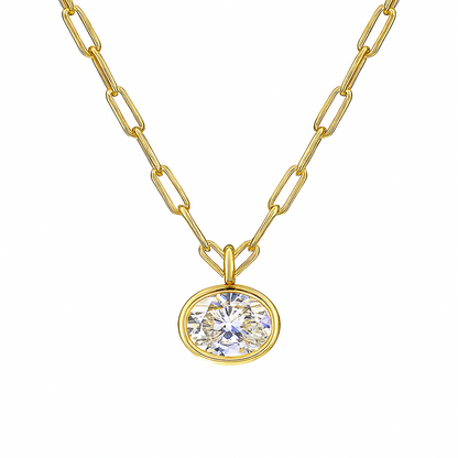 Gold necklace with a round diamond pendant on a white background