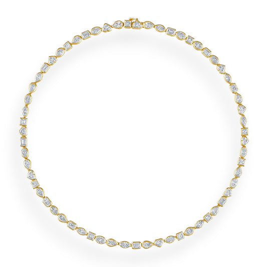 Gold necklace with clear stones on a white background