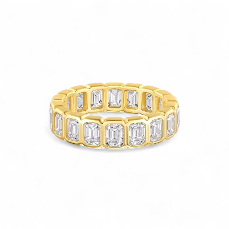 Gold emerald cut moissanite eternity band, full set ring in sleek bezel style. Luxe ethical engagement or wedding ring. Moissanite jewellery Australia