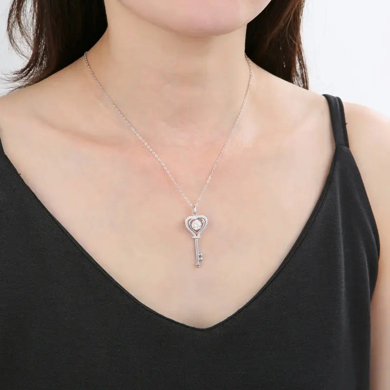 Dancing Moissanite in Key Pendant